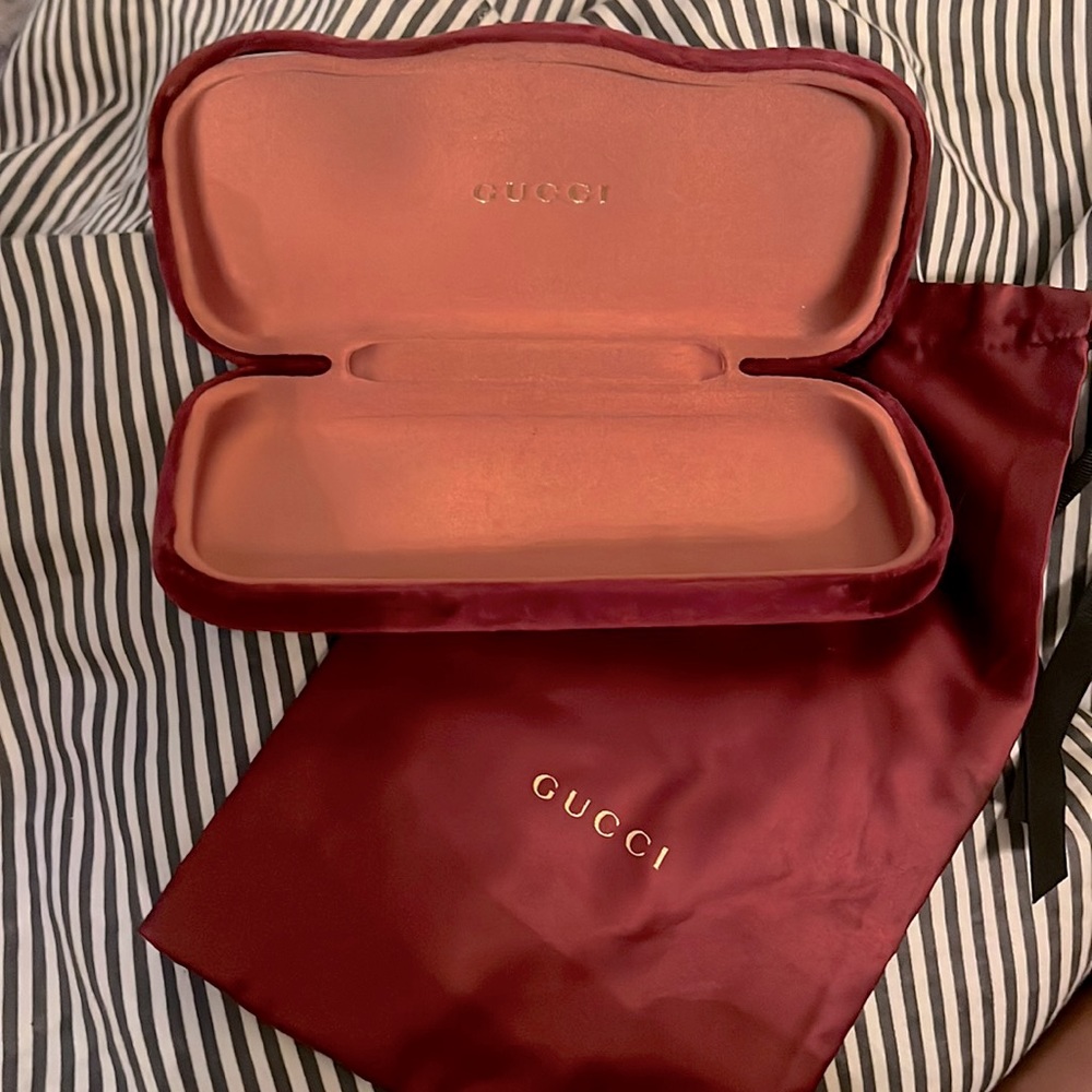Gucci and Versace sunglasses holders